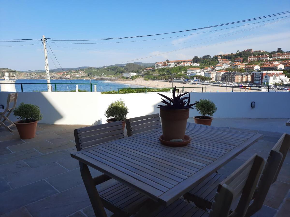 Apartamentos El Muelle Comillas Esterno foto