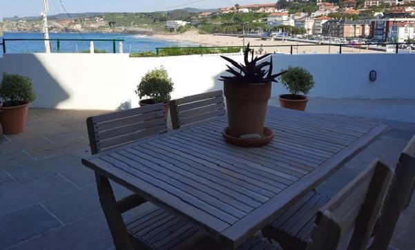 Apartamentos El Muelle Comillas Esterno foto