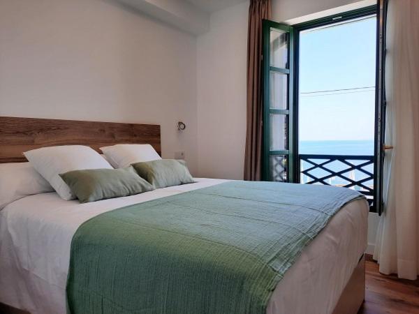Apartamentos El Muelle Comillas Esterno foto