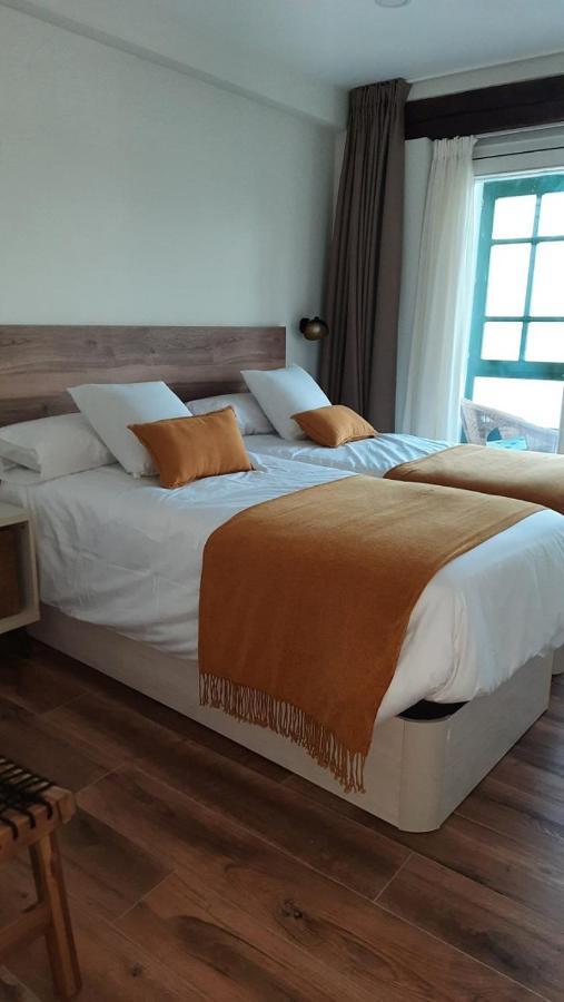 Apartamentos El Muelle Comillas Esterno foto